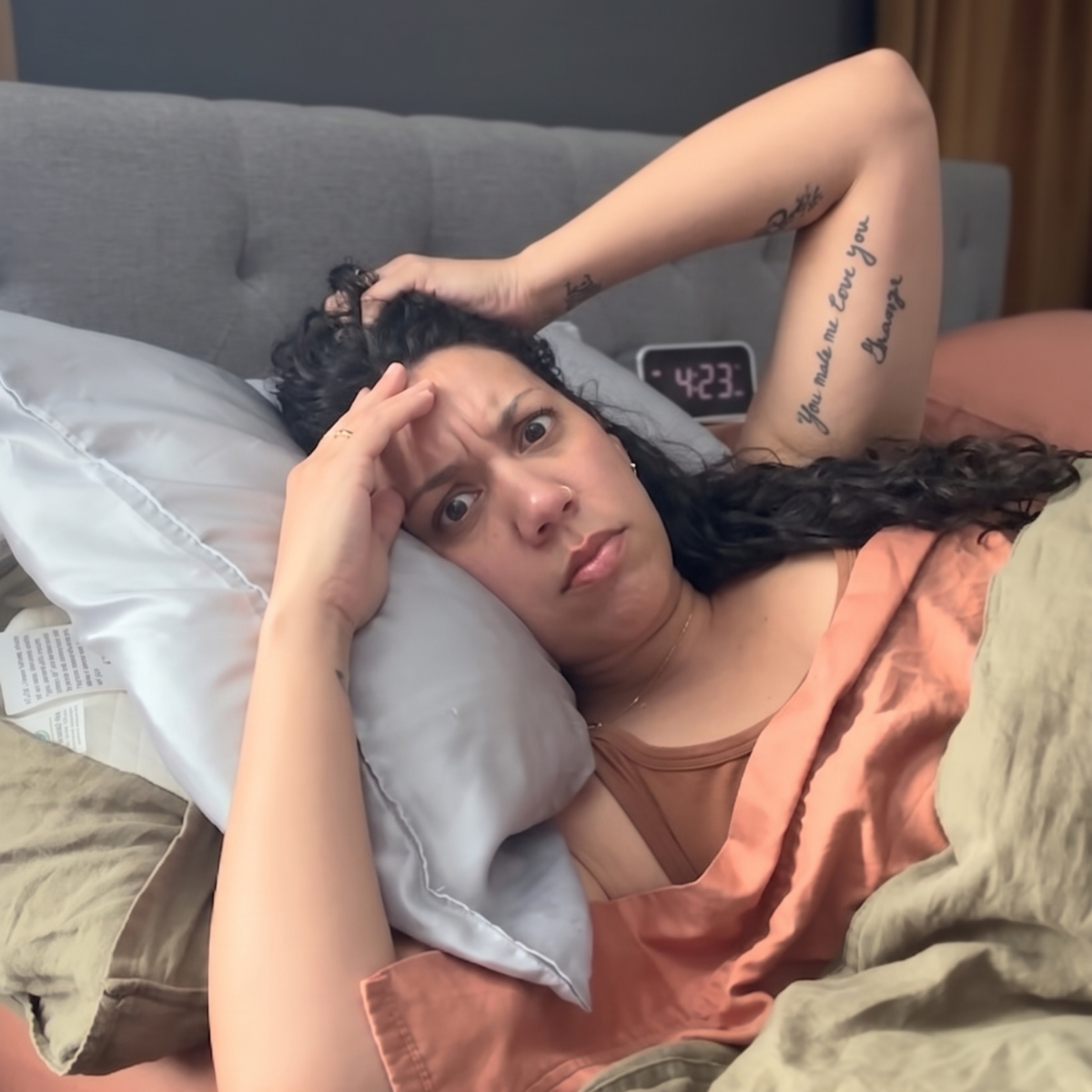 A woman lying awake at night, unable to sleep